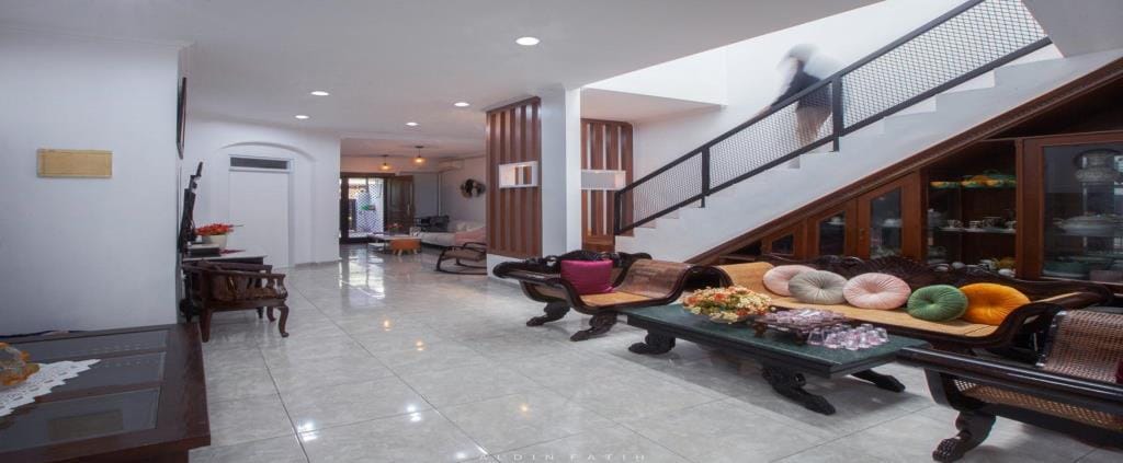 Mrs. M House