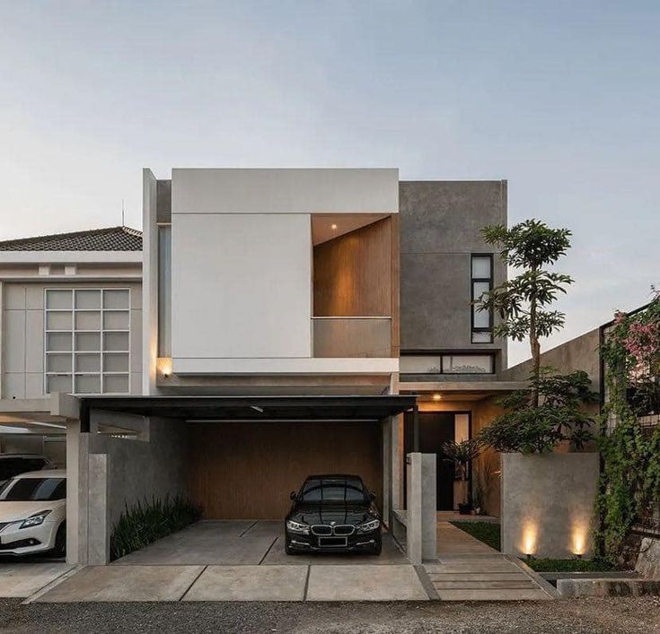 fasad rumah 2 lantai model tropis minimalis