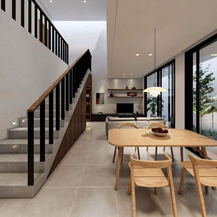 desain interior ruang tamu dengan tangga kayu